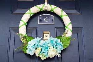 Brighten up your front door with a simple Spring Garden Wreath to celebrate the warmer weather that this season brings!