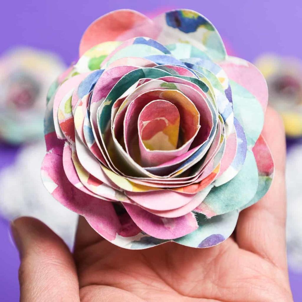 3D Paper Flowers - Sometimes it seems like all I do with my Silhouette Machine are crafts with vinyl. But I'm starting to make myself use paper more because it's easy and cheap! Like these 3D paper flowers, they're a quick craft to do on a rainy day and there are so many different kinds to make!