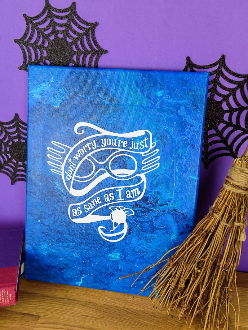 Harry Potter Acrylic Paint Poured Canvas - This poured canvas is the perfect craft night project to DIY with friends! It's fun, messy, and no two canvases will be alike! You can leave them blank or use vinyl and your Silhouette or Cricut machine to dress them up a bit, like with a fun Harry Potter inspired quote or image...or really anything that you like. This craft project is colorful and easy, all you do is mix paint with water and pour!