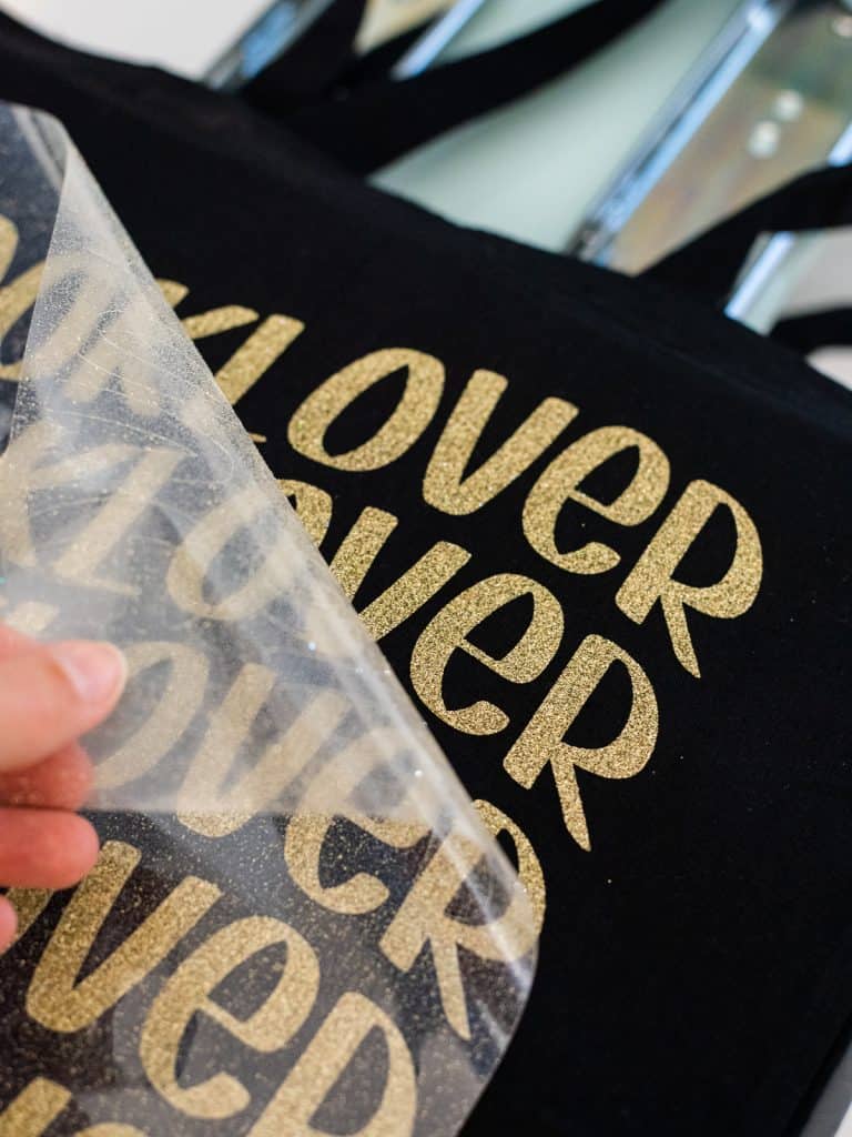Booklover glitter vinyl decal on a tote bag