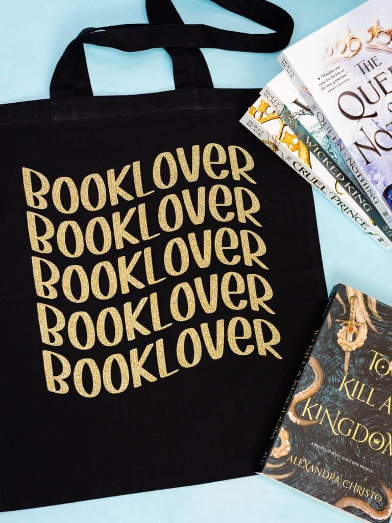 Booklover glitter vinyl decal on a tote bag