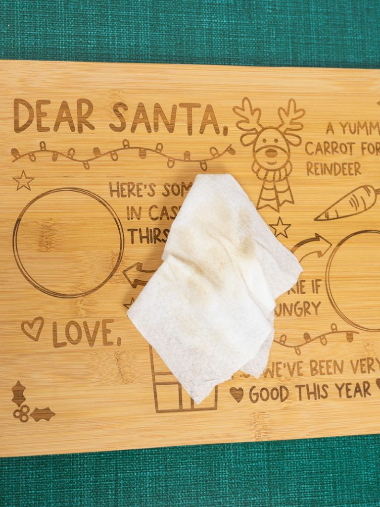 Use a alcohol wipe to clean off your cookies for santa laser cut tray. Keep wiping your cutting board until your alcohol wipe is clean and not showing any dirt on it.